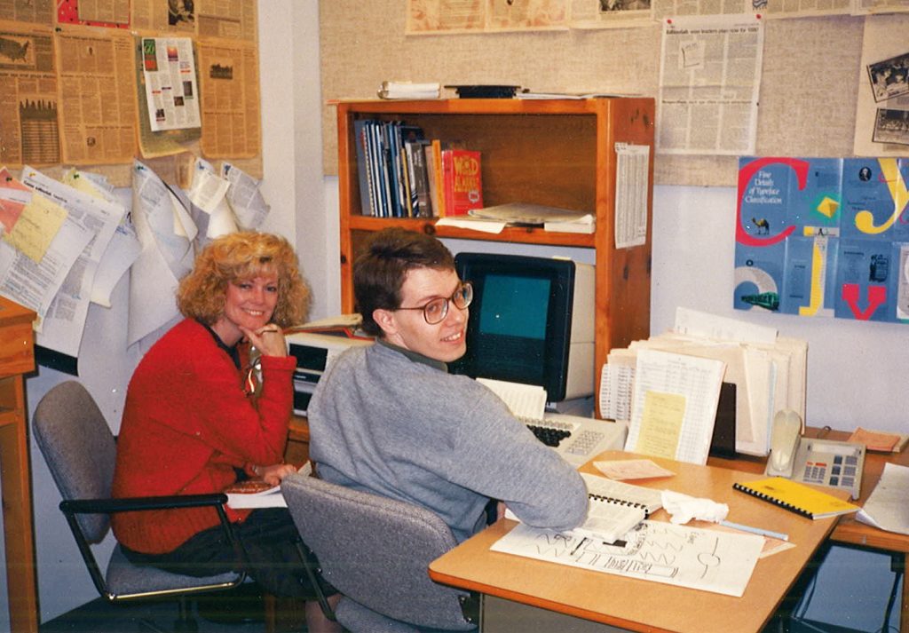 Joy McMillon and R. Scott LaMascus work on an edition of The Christian Chronicle in November 1989.