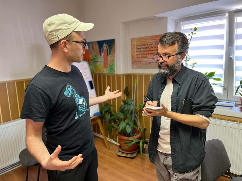 Erik Tryggestad interviews Zhenya Tochilkin, a Ukrainian minister and refugee, in Cluj-Napoca, Romania.