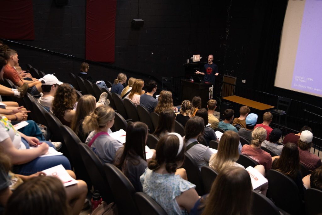 FHU senior Brayden Martin, a student ambassador for Earl Young's Team, makes a presentation to new students.