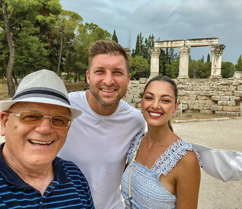 Dino Roussos leads Tim and Demi-Leigh Tebow on a tour of Corinth.