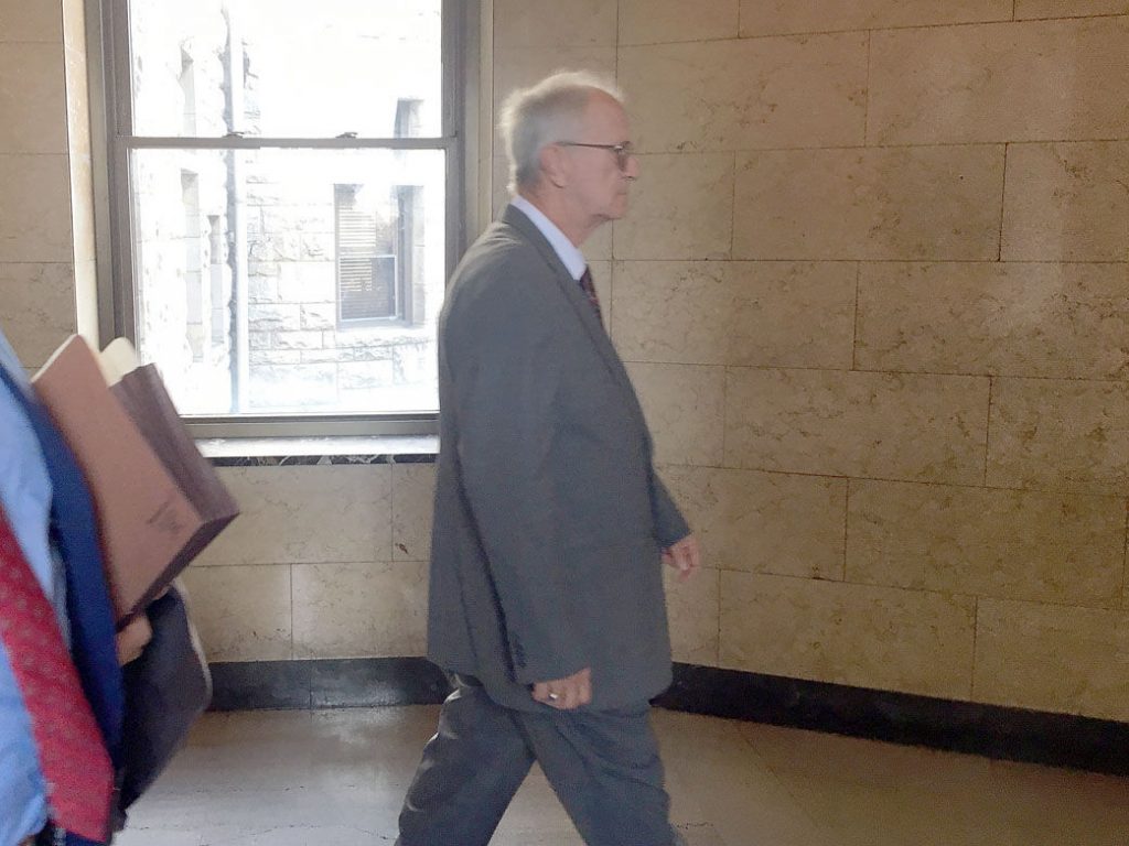 ormer youth minister Clyde E. Brothers Jr. leaves a Fayette County, Pa., courtroom after being convicted of indecent exposure and corruption of minors in October 2018.