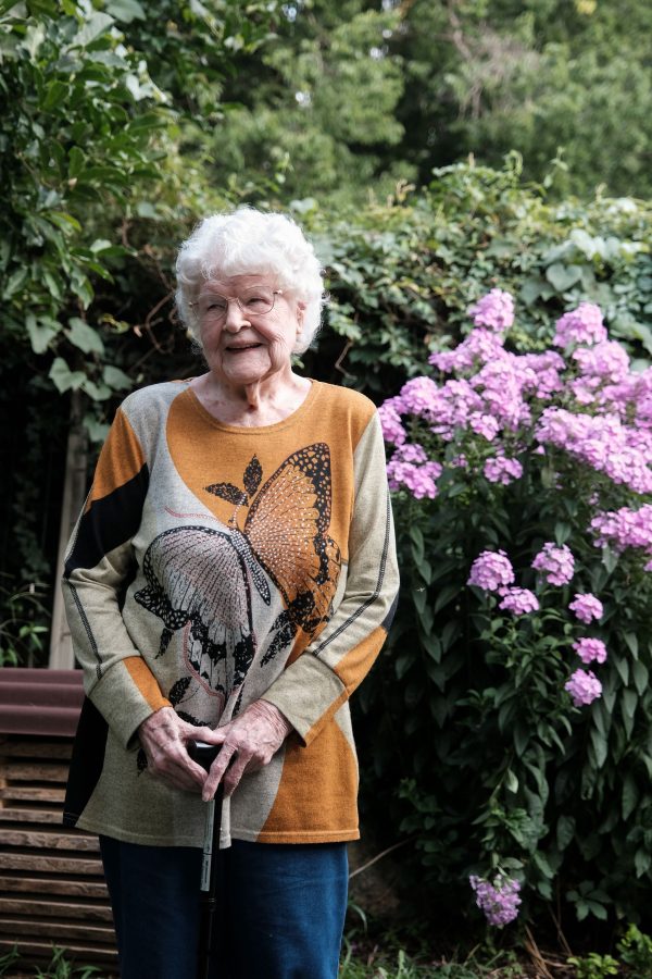 Shirley Porch poses for a portrait in one of her butterfly shirts.