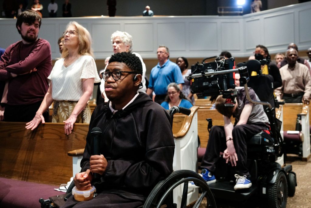 Quentin Germain, who has low muscle tone, sings with the praise team at the Brooks Avenue Church of Christ in Raleigh, N.C.