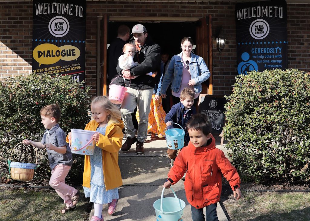 Children participate in an egg hunt at The Feast Church of Christ in Providence, R.I.