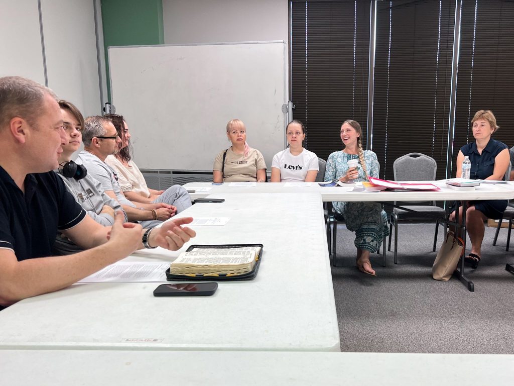 Ukrainian and Russian refugees meet for Bible class at the Memorial church.