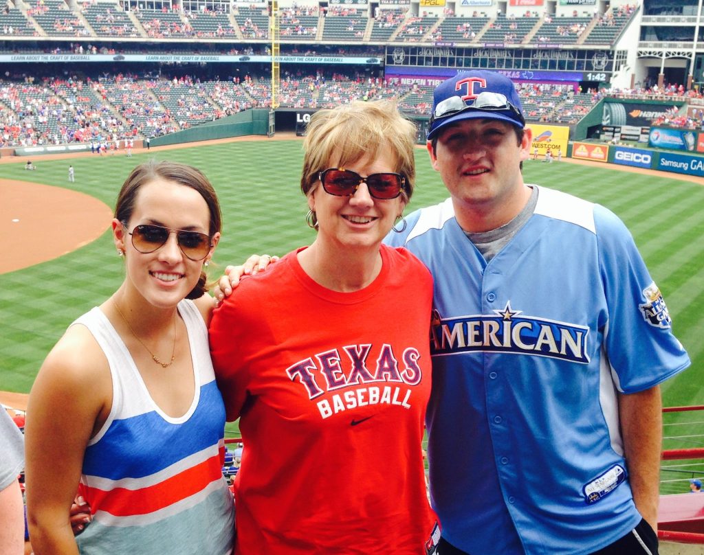 Cheryl Mann Bacon with her son Michael Bacon and daughter Kate Ashby at a Texas Rangers game on Mother's Day.