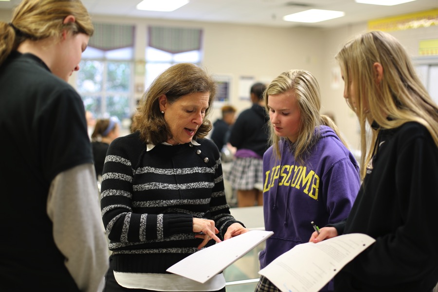 Patricia Woods works with her students at Lipscomb Academy in Nashville, Tenn.