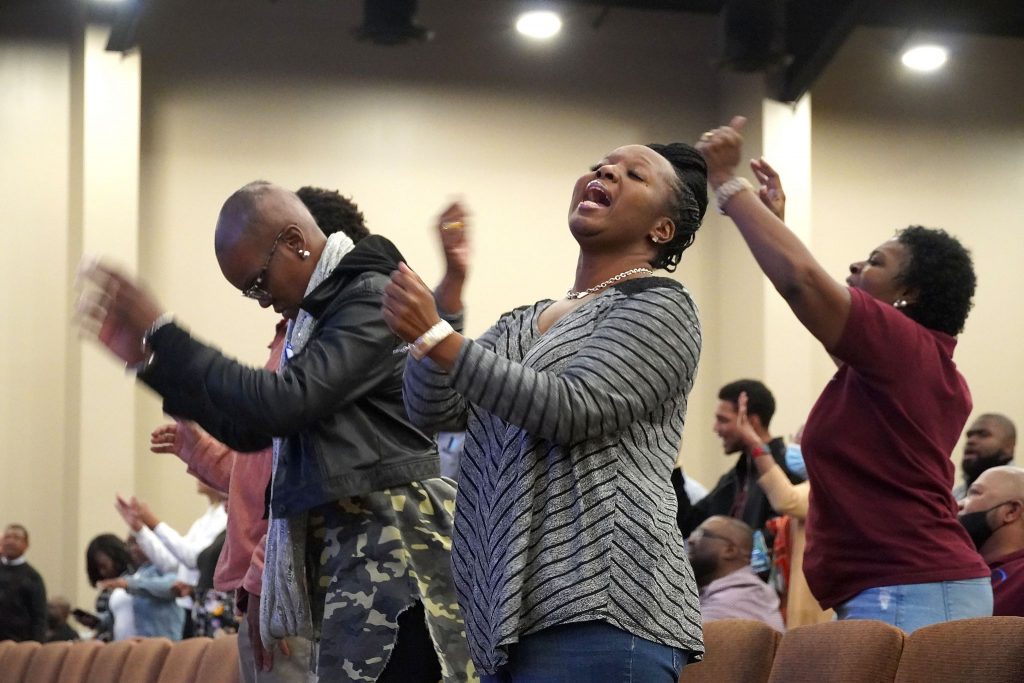 Summit participants sing during an evening worship service. “Church Music and Church Growth” was a panel discussion on the final day. “Don’t jump on something because it’s a trend,” worship leader Jason Walker said. “A praise team doesn’t replace singing. Do they hear beautiful songs or mic feedback?”