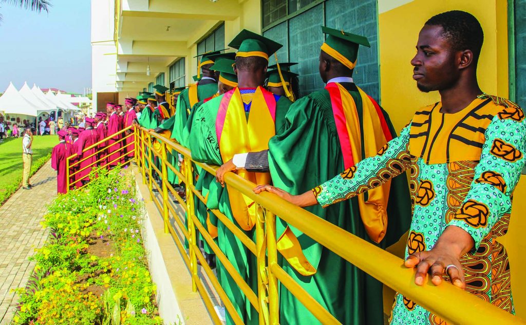 Heritage Christian College's first-ever graduates line up for a class photo on the school's campus in Accra, Ghana.