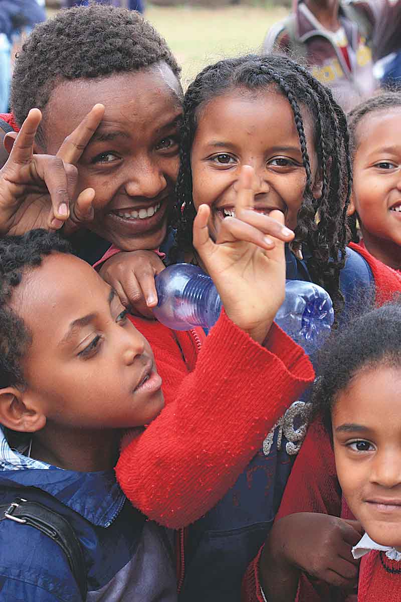 Children sign “I love you” at Makanisa School for the Deaf in Ethiopia.