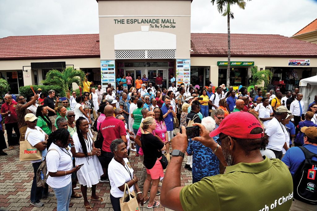 During a “Singing in the City” event in St. George’s, Christians invite Grenadians to the 50th Caribbean Lectureship.