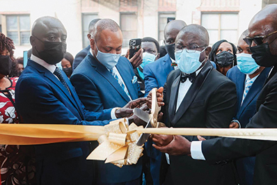 North Bronx Church of Christ leaders cut the ribbon outside the church’s new building.