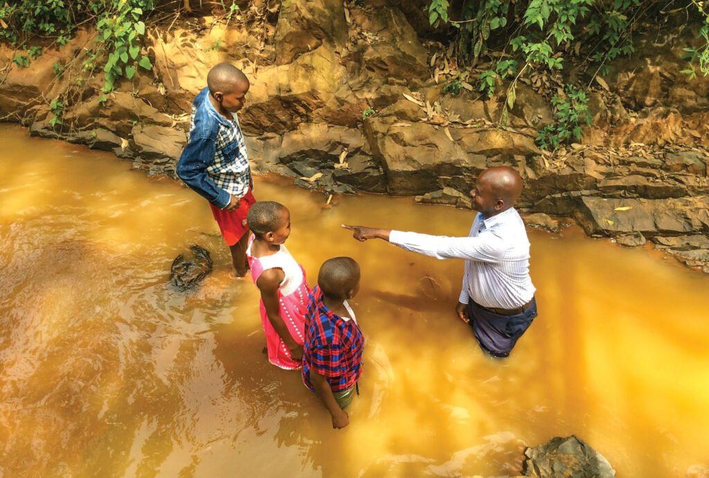 Four teenagers (one off-camera) prepare to give their lives to Christ in the village of Bonyancha, Kenya. Minister David Marube, right, baptized the teens after conducting Bible class for a new Church of Christ in the village. Marube, a minister in Kisii, Kenya, invited Simeon Ongiri, minister for the Mogesa Church of Christ, to be the guest preacher. One of the teens is the child of a man who was converted after studying the Bible through correspondence with the Grove Church of Christ in Oklahoma. “Studying the Bible with someone online, even from several miles away, can result in his baptism and cause others to be saved and the Lord’s church started,” Marube said.