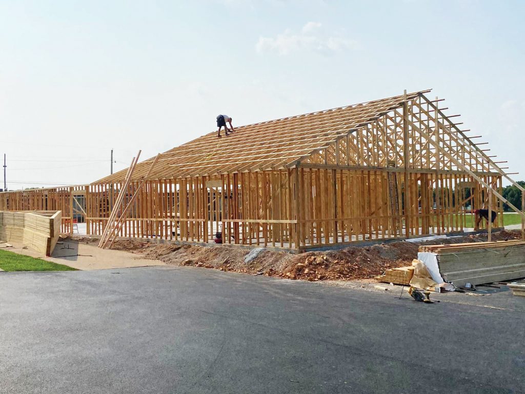 Builders work on the new fellowship hall for the Mount Vernon Church of Christ in Missouri.