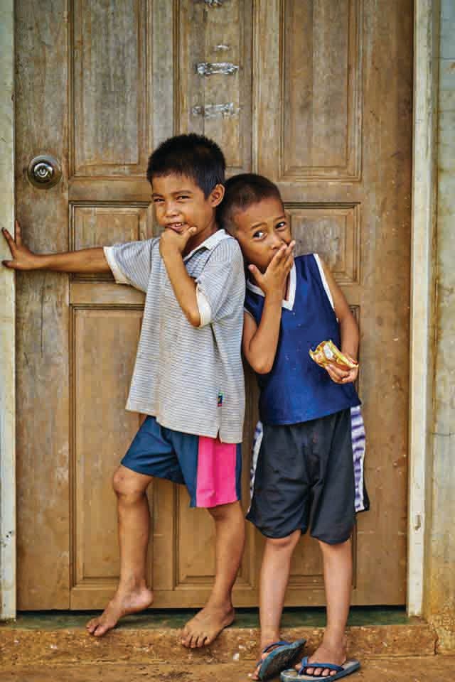 Children on Bantayan Island enjoy food provided by the MARCH mission team.