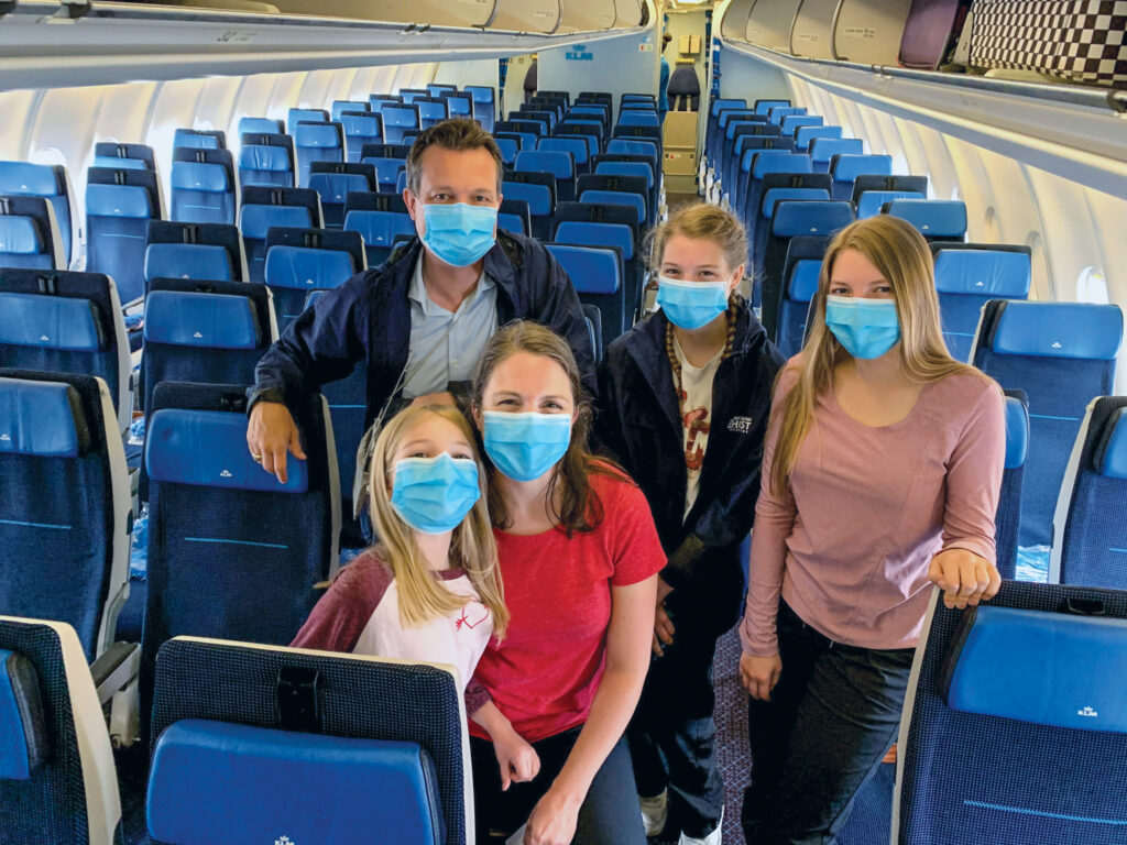 James and Becki Nored with daughters Kaylee, Emily and Gina board a flight from Washington to Amsterdam en route to Croatia.