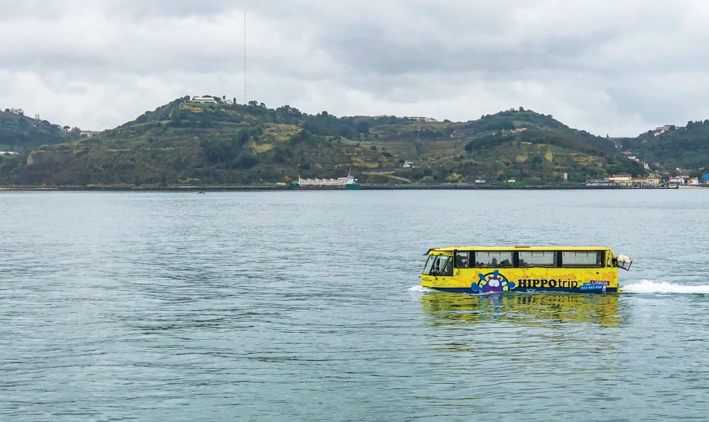 An amphibious vehicle takes visitors on a tour along the Tagus River, the longest river on the Iberian Peninsula, which meets the Atlantic in Lisbon.