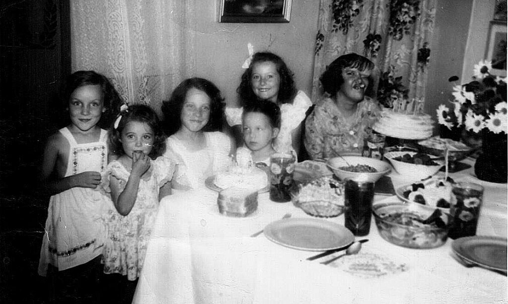 Kathleen Darby, far right, enjoys a niece’s birthday party with family in 1946.