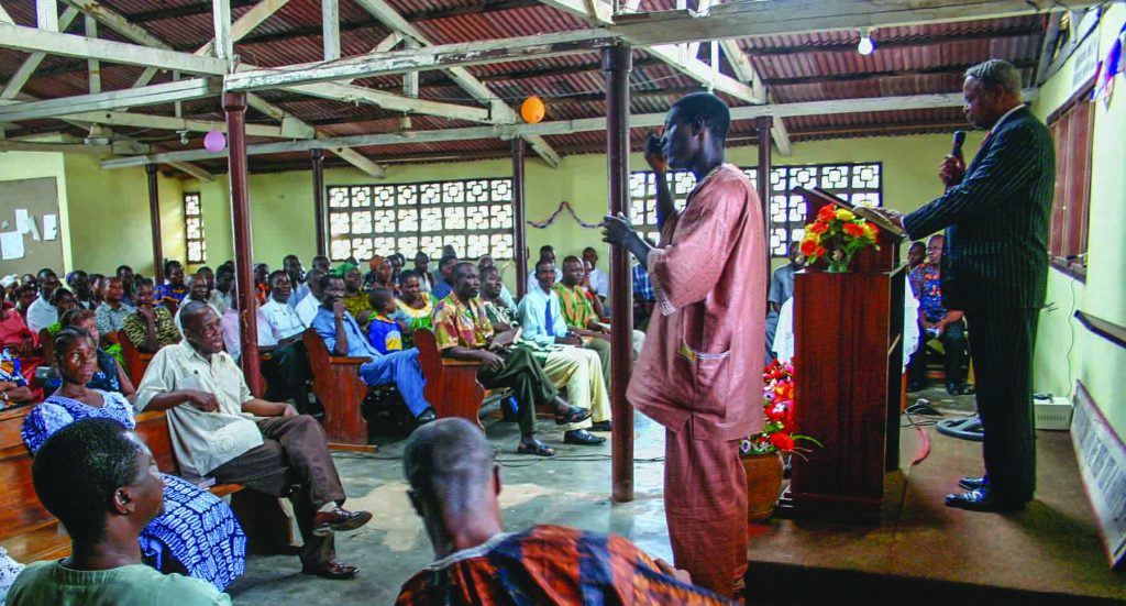 Jack Evans Sr. preaches for the Smythe Road Church of Christ in the West African nation of Liberia in 2005.