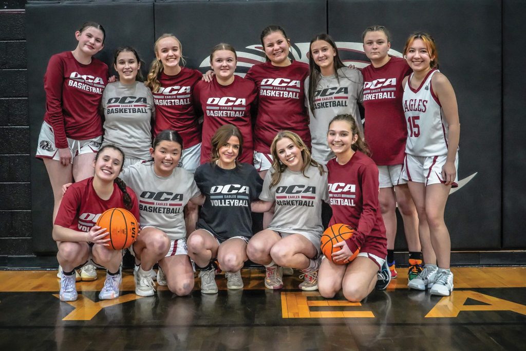 Oklahoma Christian Academy’s women’s varsity squad takes a team photo.