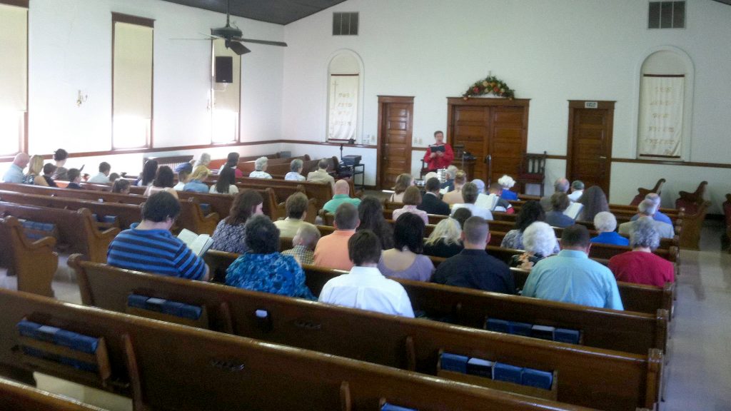 Members worship at the Portland Avenue Church of Christ in Louisville, Ky.