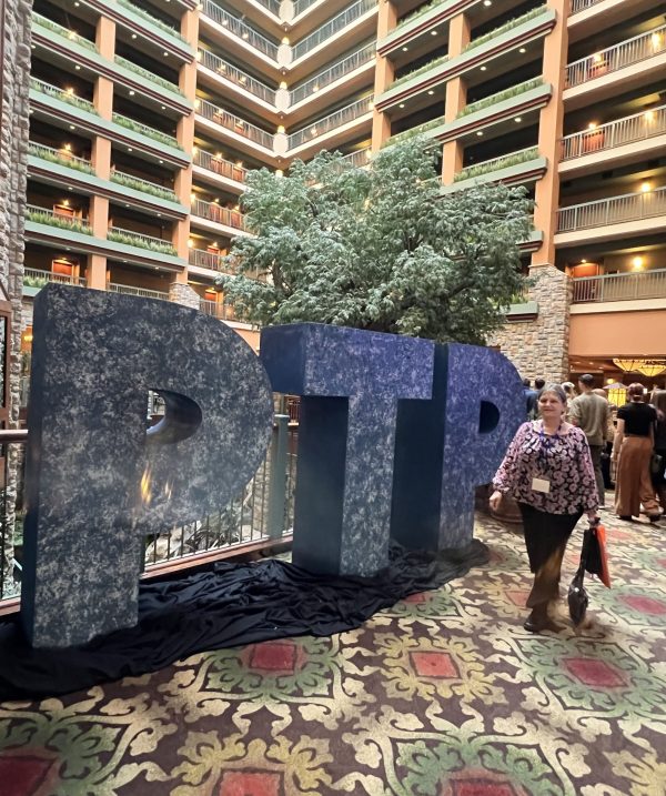 A giant "PTP" sign — short for “Polishing the Pulpit” — greets attendees at the inaugural conference at the Chateau on the Lake Resort Spa and Convention Center in Branson, Mo.