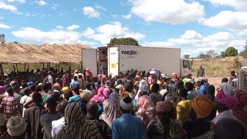 A Christian businessman lent his truck to help deliver food to refugees from Palma.