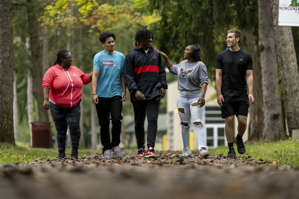 Students at Rochester Christian University walk around the campus in Rochester Hills, Mich.