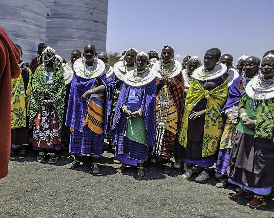 Dressed in their traditional attire, Tanzanians gather to celebrate the installation of a rainwater harvesting system at a rural clinic.