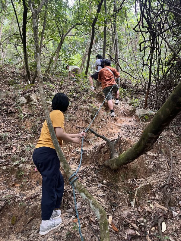 Participants in a Christian retreat begin the climb up Kepayang Hill in Seremban, Malaysia.