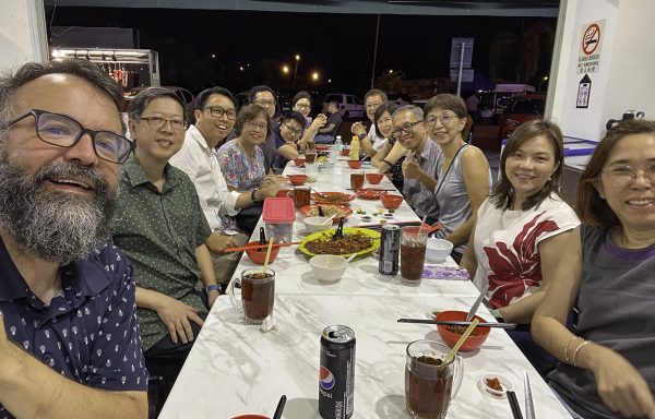 Erik Tryggestad joins a group of Christians from Singapore and Malaysia for a meal after Sunday evening worship. Since he was unable to take a tour of Kuala Lumpur with other retreat participants, Tryggestad accompanied the small group to a new facility overseen by the Seremban Church of Christ. The new meeting place, dedicated in 2020, is located in a development called Seremban 2. Members of the Seremban church use the facility for Sunday night worship and hope to launch the work as a church plant, the Sendayan Church of Christ, in the years to come.