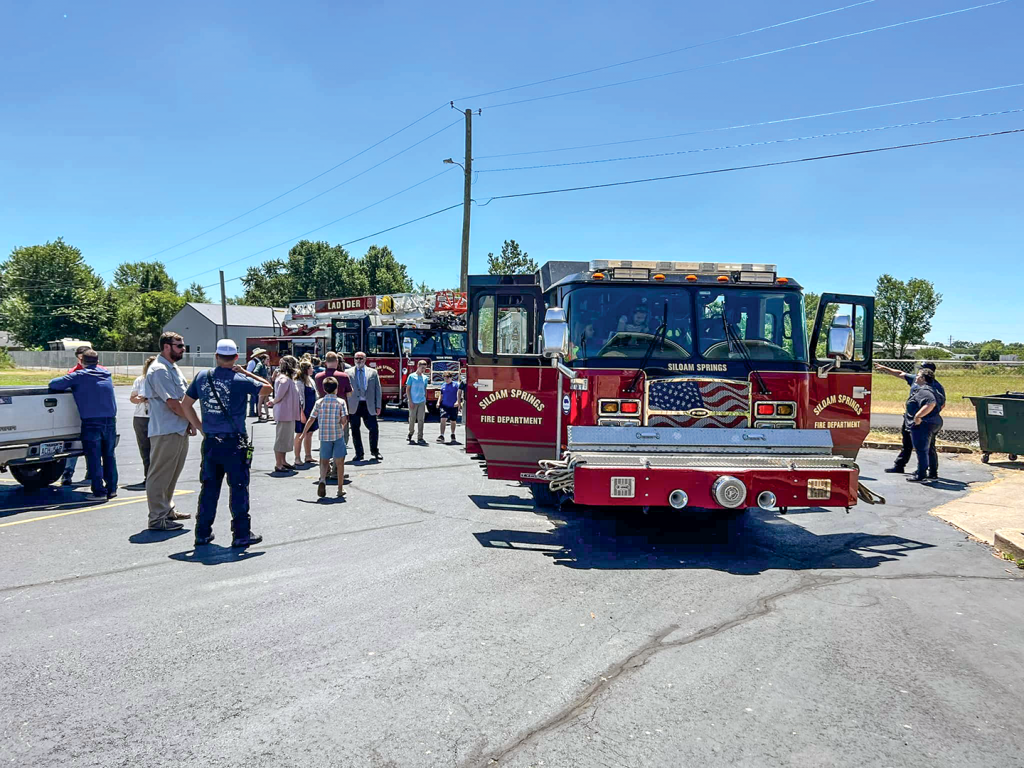 Members of the Eastgate Church of Christ in Siloam Springs, Ark., spend time with first responders, firefighters and police officers recently during a special appreciation Sunday service.